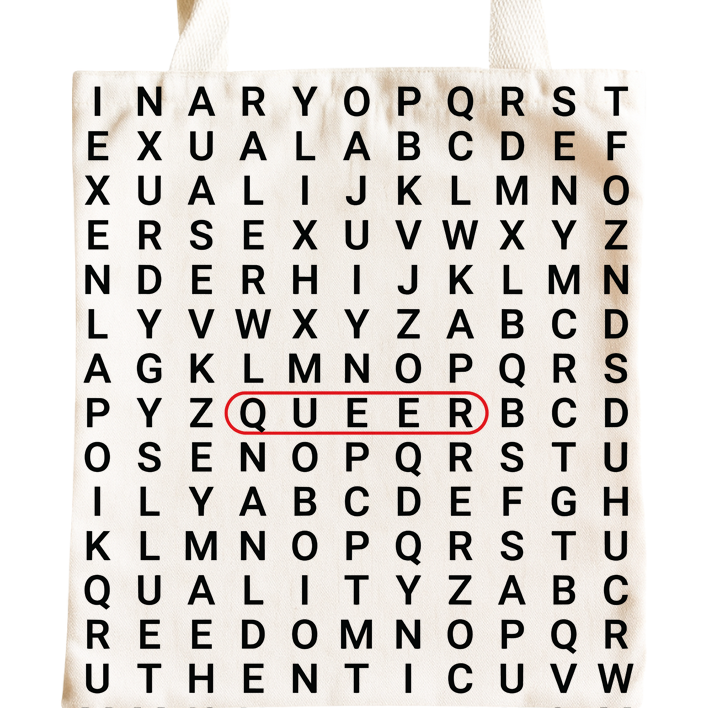 An off-white canvas tote bag with a word search pattern of black letters, where the word 'QUEER' is highlighted with a red rectangular outline, shown against a plain white background.