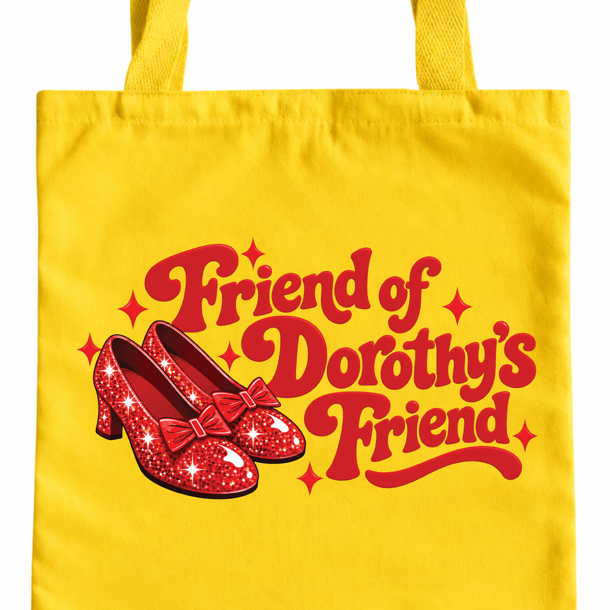 Friend of Dorothy's Friend yellow tote bag with red lettering and ruby slippers